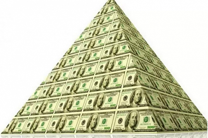 Создатель Cardano сравнил доллар США с финансовой пирамидой